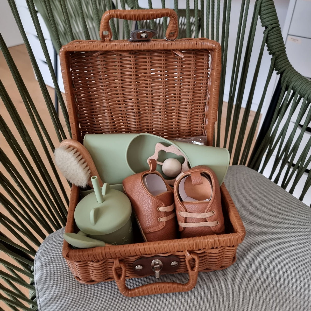 Generous baby starter set in pretty case lime green, soft olive